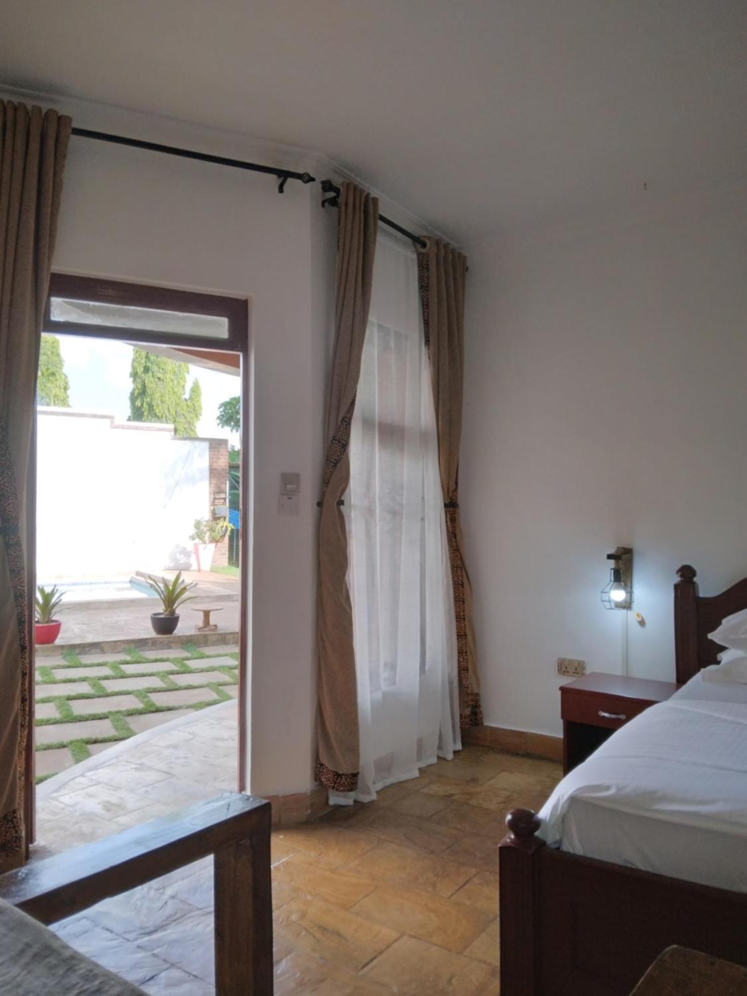 Sprunger Avenue - Tulia Homes Moshi Esterno foto